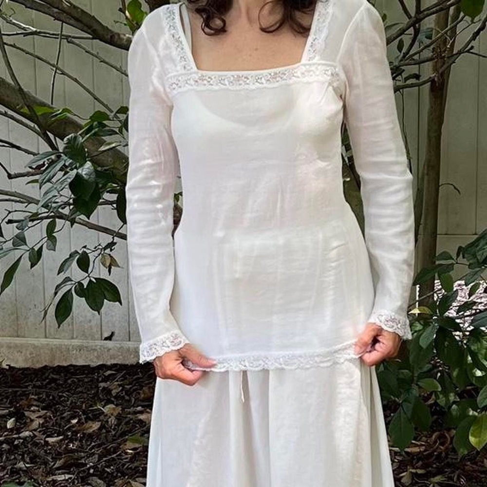 Elegant White Lace-Trimmed Blouse